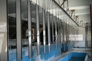 Auto spraying powder coating line